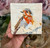 **Your Awakening** is a 4x4 original textured oil painting featuring a vibrant orange bird emerging through expressive layers of warm earth tones, ivory, blue-gray, and brown. Rich impasto and palette-knife texture give this small original artwork remarkable depth and dimension, while the impressionistic brushwork captures the bird in a moment of movement and transformation. This contemporary bird painting is a unique piece of original oil artwork for collectors drawn to textured paintings, nature-inspired art, small original canvases, and expressive impressionistic artwork.