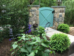 Mid-post mount contemporary ring gate latch by Snug Cottage Hardware, on a colorful garden gate. It is sold by 360 Yardware and installed on the side of the gate that swings toward you. Stainless steel with black powder coat, it fits contemporary and traditional styled gates. Mid-post mount contemporary ring gate latch by Snug Cottage Hardware, on a colorful garden gate. It is sold by 360 Yardware and installed on the side of the gate that swings toward you. Stainless steel with black powder coat, it fits contemporary and traditional styled gates.