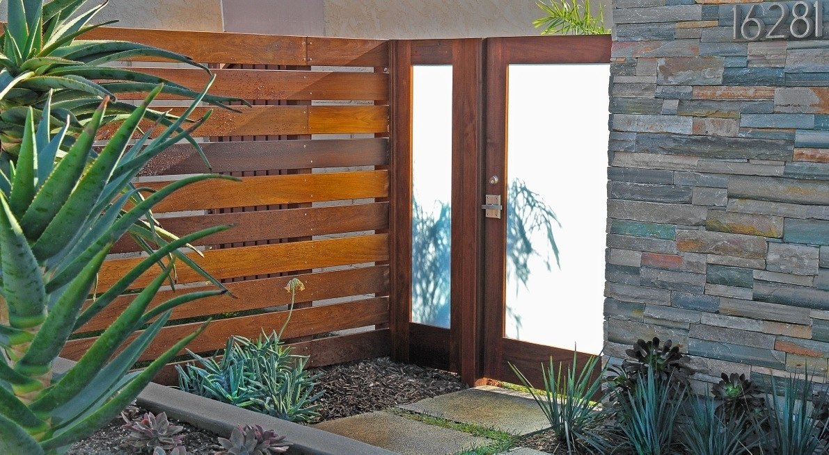 Modern alta stainless steel gate latch on wood gate built by lido gates