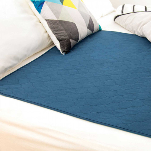 Conni Waterproof Bed Pad - Teal Blue Demonstration