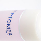 A section of a pink cosmetic bottle displaying "PHYTOMER" brand name in blue text. A section of a pink cosmetic bottle displaying "PHYTOMER" brand name in blue text.
