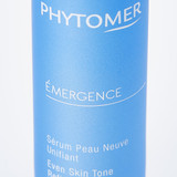 Blue Phytomer Émergence bottle showing "Sérum Peau Neuve Unifiant" and "Even Skin Tone" product text.