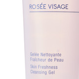 Detail shot focusing on the "Rosée Visage" product name and French/English product descriptions on the tube.