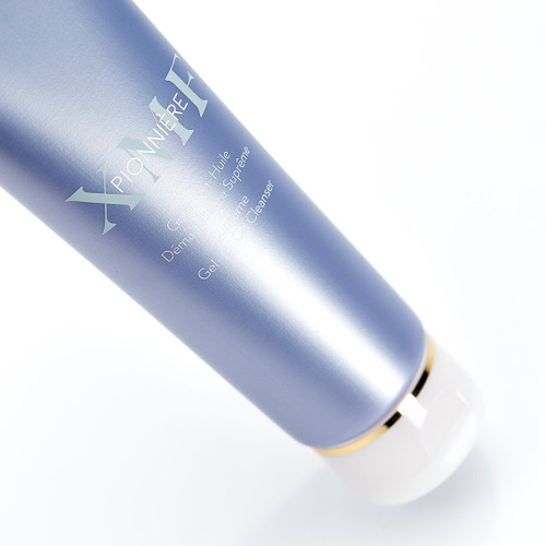 Blue Phytomer tube showing product text including "Gel Supreme Cleanser" with gold accents. Blue Phytomer tube showing product text including "Gel Supreme Cleanser" with gold accents.