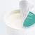 Open lid of Phytomer Cyfolia Youth cream revealing the white cream texture inside with the teal lid partially visible.