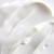 Close-up of white cream texture showing smooth, creamy consistency.