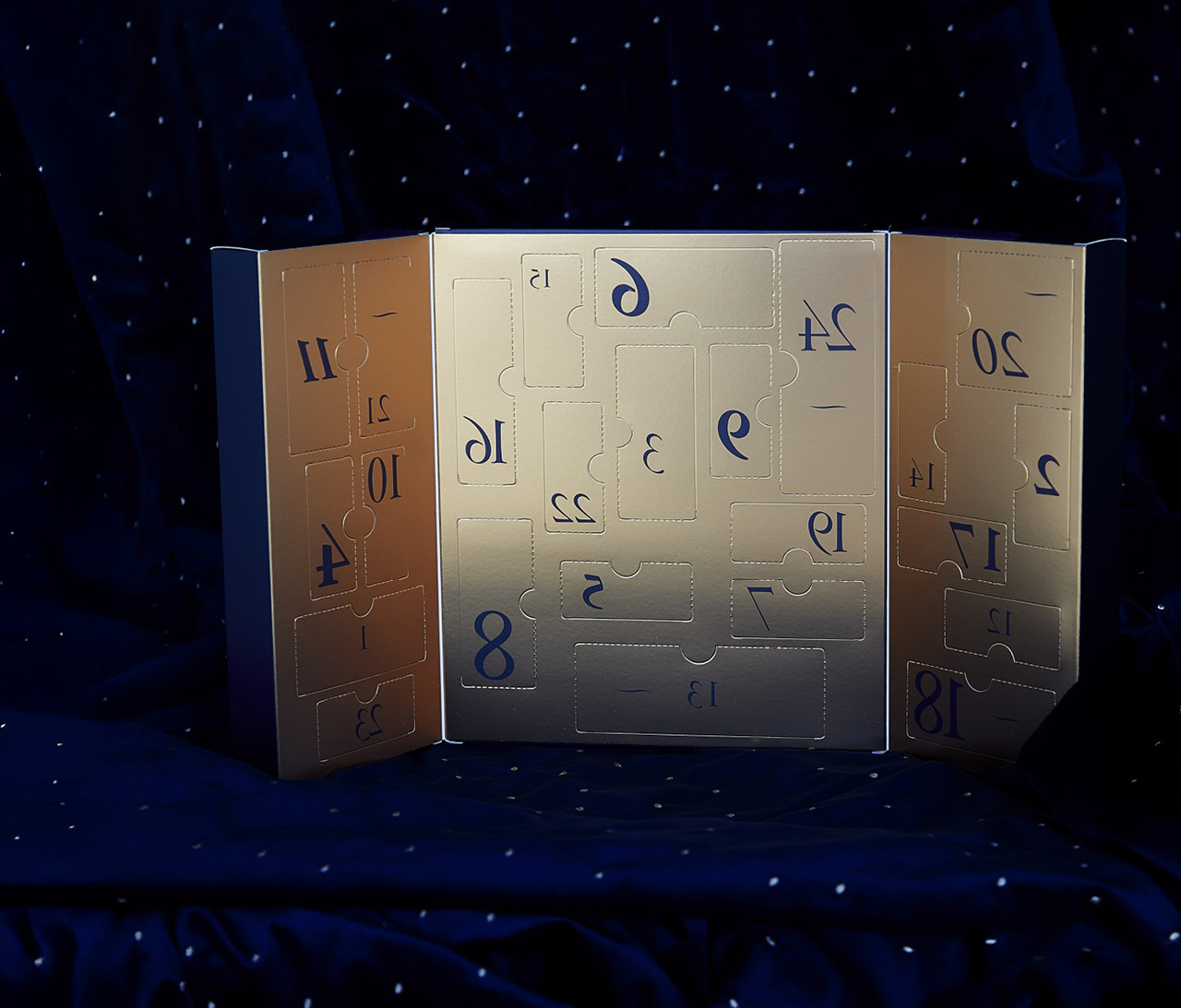 Advent calendar opened with gold packaging 