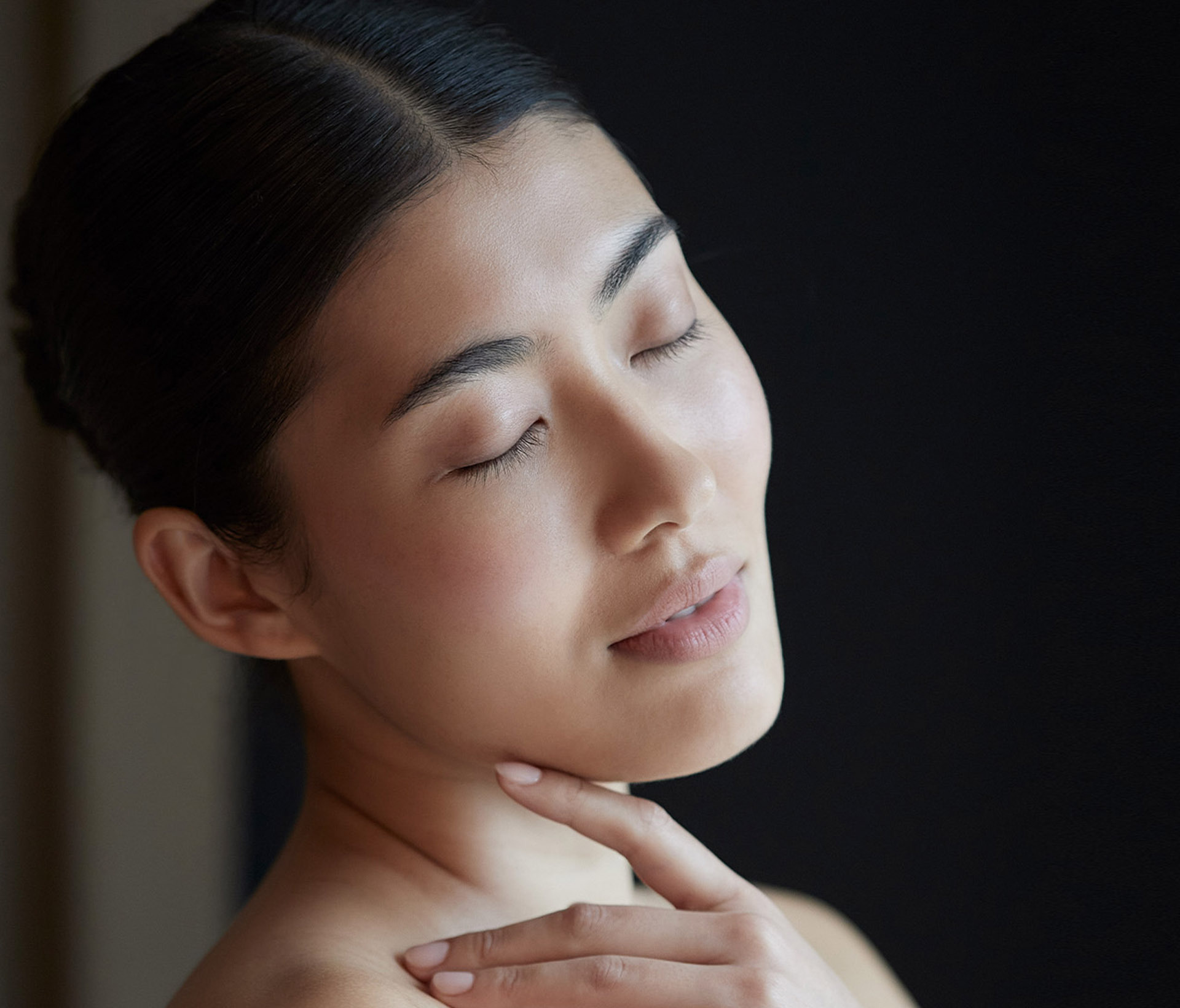 Woman Gazing over her shoulder