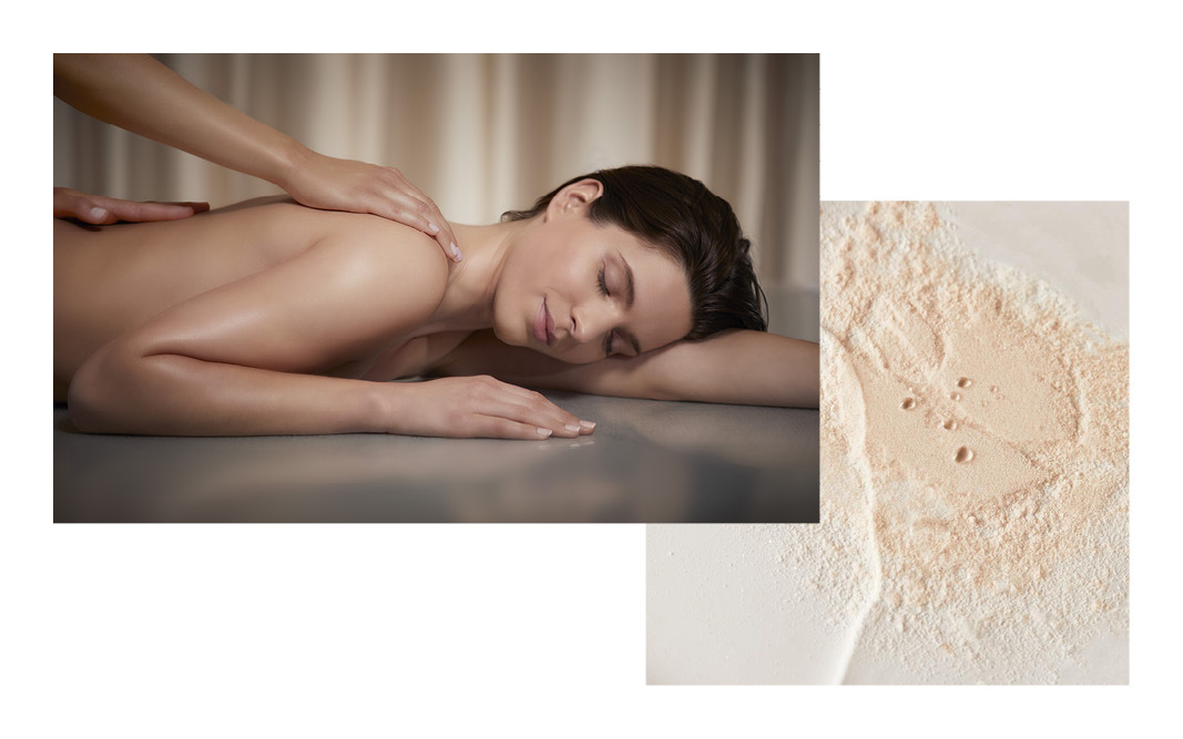 Professional spa massage therapy session with client relaxing on treatment table