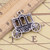 Carriage Charm, antique silver