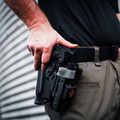 Pistol holster mount for tourniquet carrier.  Tourniquet mounting bracket for Safariland SLS / ALS holsters.  Red dot and non-red dot sight models.   Red dot and non-red dot sight models. Eleven 10 RIGID TQ Case Holster Mount.
