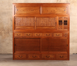 Antique Japanese Gifu-style Mizuya Tansu kitchen chest from the 1920s, crafted from Hinoki and Keyaki wood with bamboo sliding panels, shrine compartment, and multiple drawers.