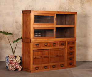 Taisho-era Japanese Mizuya Tansu chest with two stackable sections, featuring sliding glass doors, varied drawers, and hidden storage, handcrafted from Hinoki and Cryptomeria wood.