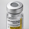 0.9% Sodium Chloride Injection USP — 10 mL glass vials, preservative‑free — Box of 10 (Omega Laboratories) — Contextual / compliance close‑shot (stopper & cap detail)
