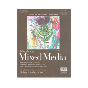 A brown paper pad that says "Strathmore Mixed Media" and has an abstract floral illustration on the cover.