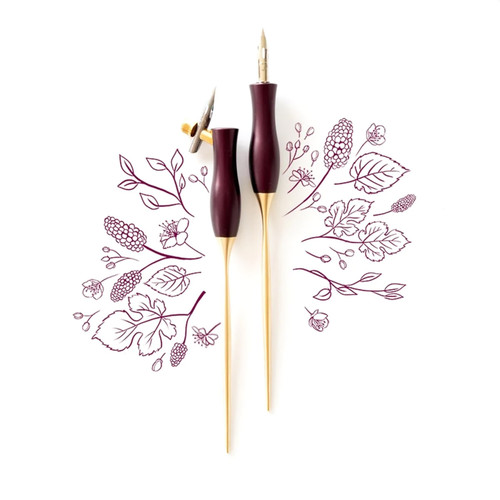 Two burgundy and gold penholders, one oblique and one straight, surrounded by calligraphic flower illustrations.