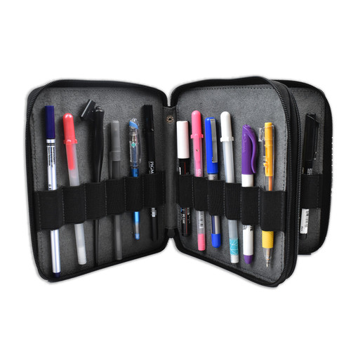 A square case propped open with a gray suede interior and black rubber straps holding various pens and markers.