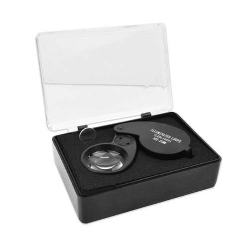A black jeweler's loupe in a foam protective block placed into a black box with a clear lid that's open.