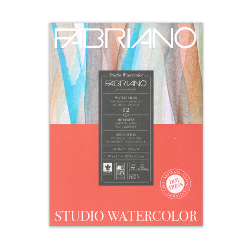 An orange-red paper pad with a watercolor design that says" FABRIANO STUDIO WATERCOLOR"