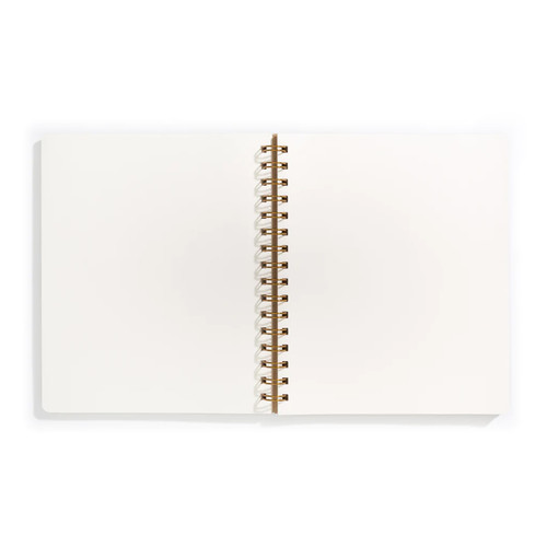 White wirebound notebook open and laying flat with blank pages.