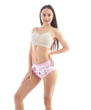 Female model wearing Princess Pink training pants, front-view.