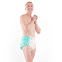 Side-view of male model wearing Rearz adult diaper.