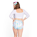Female model wearing Daydreamer training pants, back-view.
