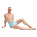 Front-view of male model wearing Adult diaper, propped-up.