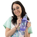 Female model holding Lil' Monsters bottle.