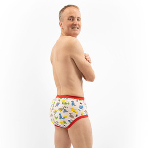 Male model wearing Dinosaur training pants, side-view.