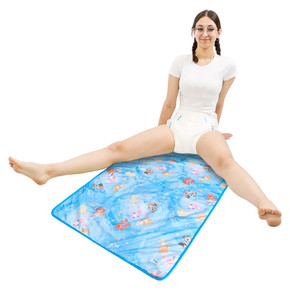 Female model sitting on the absorbent Splash change pad.