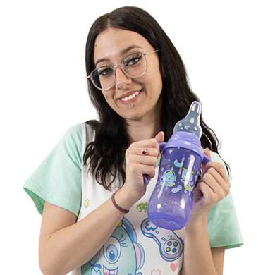 Female model holding Lil' Monsters bottle.