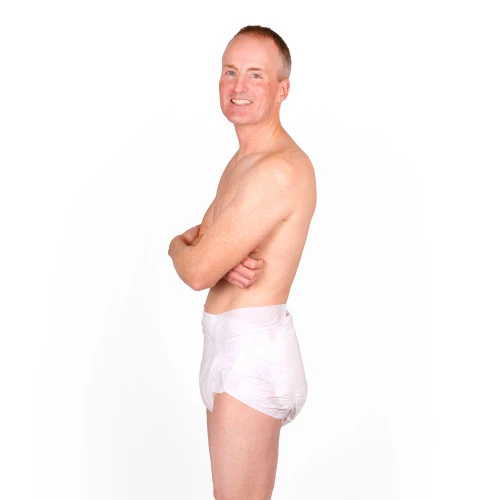 Male model wearing InControl BeDry Night Premium Briefs, side-view.