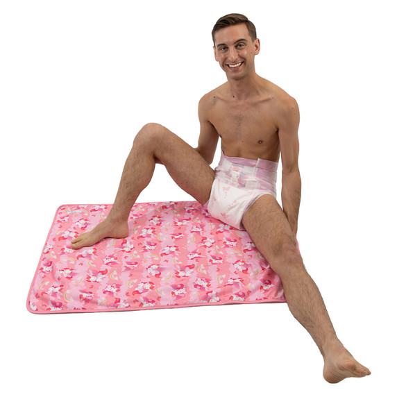 Male model sitting on change pad.