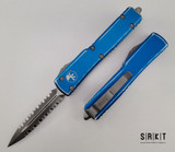 Microtech UTX-70 D/E OTF Auto - Apocalyptic Bohler M390 2-Side Fully Serrated Dagger Blade - Distressed Blue 6061-T6 Aluminum Handle Chassis - APOC Tip-Down Pocket Clip & Hardware - Thumb Slide Double-Action Out the Front Automatic | Made in USA