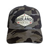 Badlands Paintball camo trucker hat with mountain logo patch front view
