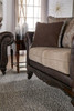 Elmbrook Upholstered Rolled Arm Loveseat with Intricate Wood Carvings Brown / CS-508572