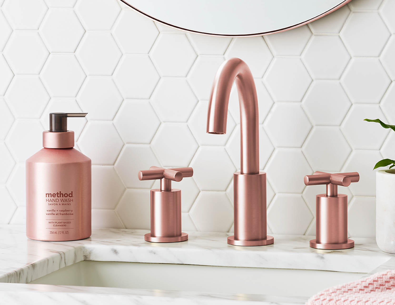 Washing hands with Method aluminum Vanilla + Raspberry soap
