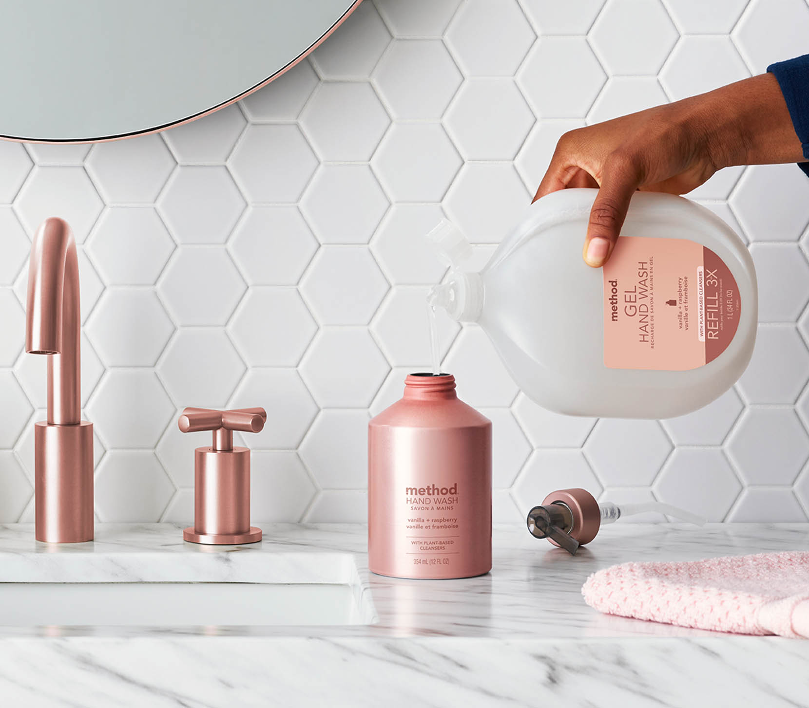 Method refill bottle being poured in to aluminum soap bottle