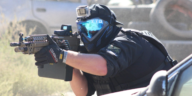 Airsoft Player Wearing Airsoft Mask for Protection