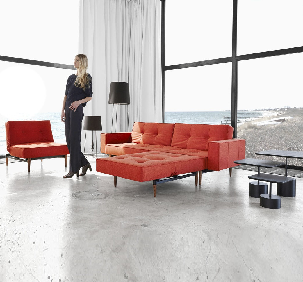 Split Back Deluxe Red Sofa Bed with Arms in a Living room design