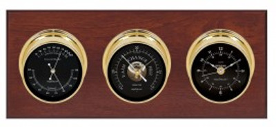 Maximum Executive Three-Instrument Weather Station with mahogany panel, brass case, black dial Maximum Executive Three-Instrument Weather Station with mahogany panel, brass case, black dial