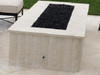 Finished Rectangle Fire Pit: Fire pit kit shown finished with quartzite ledger panels white stone, white marble top and black lava rocks.