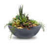 The Outdoor Plus Sedona Concrete Planter: As shown round GFRC planter in the gray finish.
