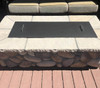 Aluminum Fire Pit Cover Shown With Two Stainless Steel Handles In the Textured Black Finish.