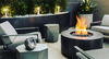 Cylinder Gas Fire Pit- Shown in Aluminum with a Hammered Bronze Powder Coat Finish and Black Lava Rocks