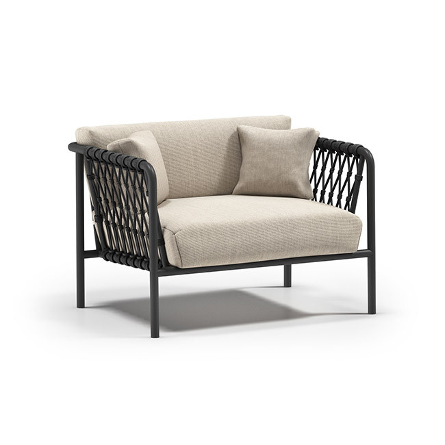 Homecrest Rowan outdoor club chair with a dark aluminum frame, graphite woven rope, and light-colored cushions