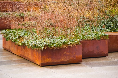 How to Protect Your Patio and Hardscape From Corten Planter Rust Runoff