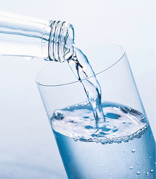 pouring water into glass