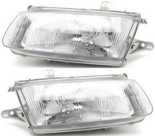 1995-1996 Mazda Protege Headlights Driver Left and Passenger Right Side Halogen